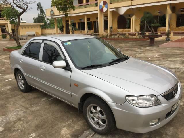 Mazda 323 2004 - Cần bán xe Mazda 323 đời 2004, màu bạc, giá 210tr