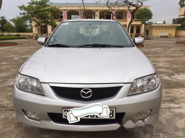 Mazda 323 2004 - Cần bán xe Mazda 323 đời 2004, màu bạc, giá 210tr