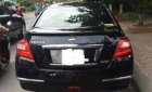 Nissan Teana  AT 2011 - Gia đình cần bán Nissan Teana AT đời 2011, màu đen đã đi 65000 km