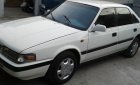 Mazda 323 1990 - Cần bán lại xe Mazda 323 1990, màu trắng, nhập khẩu chính hãng