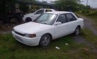 Mazda 323 1995 - Cần bán xe Mazda 323 đời 1995, màu trắng xe gia đình, giá tốt