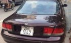Mazda 626 MT 1994 - Tôi bán ô tô Mazda 626 MT sản xuất 1994, màu nâu số sàn