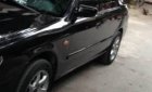 Mazda 626 2000 - Cần bán xe Mazda 626 2000, màu đen, nhập khẩu chính hãng xe gia đình