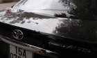 Toyota Corolla altis MT 2011 - Bán Toyota Corolla Altis MT sản xuất 2011, màu đen số sàn giá cạnh tranh