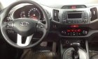 Kia Sportage 2.0AT 2010 - Bán xe Kia Sportage 2.0AT 2010, màu bạc xe gia đình