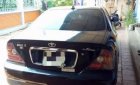 Daewoo Magnus 2005 - Bán xe Daewoo Magnus đời 2005, màu đen