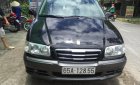 Hyundai Trajet AT 2004 - Bán Hyundai Trajet sản xuất 2004, màu đen, xe nhập số tự động, giá 320tr