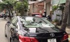Toyota Camry 2.4G 2011 - Cần bán gấp Toyota Camry 2.4G sản xuất 2011, màu đen chính chủ
