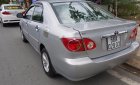 Toyota Corolla altis 1 3MT 2003 - Bán Toyota Corolla altis 1 3MT đời 2003, màu bạc xe gia đình, 245tr
