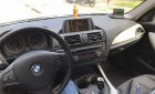 BMW 1 Series 116i 2014 - Cần bán xe BMW 1 Series 116i đời 2014, màu bạc