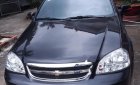 Chevrolet Lacetti 2014 - Cần bán xe Chevrolet Lacetti sản xuất 2014, màu đen xe gia đình