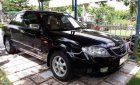 Mazda 323 Classic GLX 2004 - Bán Mazda 323 Classic GLX đời 2004, màu đen, nhập khẩu