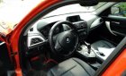 BMW 1 Series  116i  2014 - Chính chủ bán BMW 1 Series 116i đời 2014, màu cam