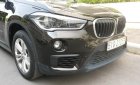 BMW X1 sDrive 20i 2015 - Bán BMW X1 sDrive 20i 24.000km model 2016, xe còn mới, không đâm đụng