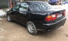 Mazda 323 1997 - Bán xe Mazda 323 đời 1997, màu đen, 95 triệu