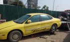 Ford Taurus   AT  1997 - Cần bán lại xe Ford Taurus AT đời 1997, màu vàng, 150tr