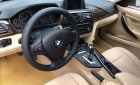 BMW 3 Series 320i 2014 - Cần bán lại xe BMW 3 Series 320i đời 2014, màu trắng, xe nhập