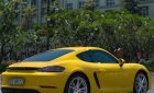 Porsche Cayman 718 2017 - Cần bán lại xe Porsche Cayman 718 2017, màu vàng, nhập khẩu nguyên chiếc như mới