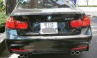 BMW 3 Series 320i 2014 - Bán xe BMW 3 Series 320i đời 2014, màu đen, xe nhập 