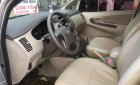 Toyota Innova 2.0E 2014 - Cần bán lại xe Toyota Innova 2.0E năm 2014, màu bạc xe gia đình