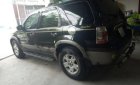 Ford Escape XLT 3.0 AT 2005 - Cần bán lại xe Ford Escape XLT 3.0 AT 2005, màu đen
