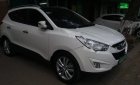 Hyundai Tucson 2.0 AT 4WD 2011 - Cần bán lại xe Hyundai Tucson 4WD năm 2011, màu trắng, xe nhập chính chủ, 560 triệu