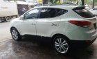 Hyundai Tucson 2.0 AT 4WD 2011 - Cần bán lại xe Hyundai Tucson 4WD năm 2011, màu trắng, xe nhập chính chủ, 560 triệu