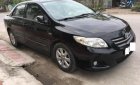 Toyota Corolla altis 1.8G MT 2009 - Bán Toyota Corolla altis 1.8G MT đời 2009, màu đen chính chủ giá cạnh tranh