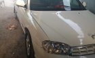 Kia Spectra 2003 - Cần bán xe Kia Spectra đăng ký 2003, màu trắng ít sử dụng, giá tốt 115tr