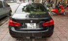 BMW 3 Series 320i 2015 - Bán ô tô BMW 3 Series AT sản xuất 2015, màu đen