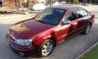 Ford Laser 1.8 MT 2003 - Cần bán ô tô Ford Laser máy 1.8 lít đời 2003, màu đỏ