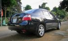 Toyota Vios 1.5E 2009 - Bán Toyota Vios 1.5E năm 2009, màu đen