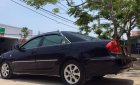 Toyota Camry 2.4G 2006 - Bán xe Toyota Camry 2.4 năm 2006, màu đen số sàn