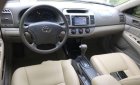 Toyota Camry   2004 - Cần bán gấp Toyota Camry đời 2004, màu đen