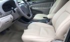 Toyota Camry   2004 - Cần bán gấp Toyota Camry đời 2004, màu đen