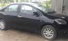 Toyota Vios E 2009 - Cần bán Toyota Vios E sản xuất 2009, màu đen