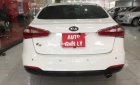 Kia K3 2014 - Cần bán gấp Kia K3 sản xuất 2014, màu trắng số sàn, giá tốt