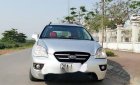 Kia Carens 2.0 AT  2010 - Cần bán lại xe Kia Carens 2.0 AT sản xuất năm 2010, màu bạc chính chủ, giá tốt