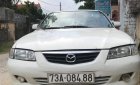 Mazda 626 2002 - Cần bán gấp Mazda 626 2002, màu trắng