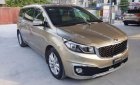 Kia Rondo CRDi 2.2AT 2016 - Bán ô tô Kia Rondo CRDi 2.2AT đời 2016, màu vàng