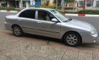 Kia Spectra 2004 - Bán ô tô Kia Spectra đời 2004, màu bạc