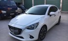 Mazda 2 1.5 AT 2015 - Gia đình bán xe Mazda 2 1.5 AT năm sản xuất 2015, màu trắng