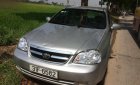 Daewoo Lacetti EX 2010 - Gia đình bán Daewoo Lacetti 1.6 sản xuất năm 2010, màu vàng cát