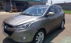 Hyundai Tucson 2.0 AT 4WD 2011 - Cần bán gấp Hyundai Tucson 2.0 AT 4WD 2011, màu nâu, xe nhập, 539 triệu