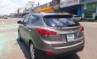 Hyundai Tucson 2.0 AT 4WD 2011 - Cần bán gấp Hyundai Tucson 2.0 AT 4WD 2011, màu nâu, xe nhập, 539 triệu