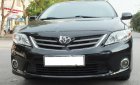 Toyota Corolla XLI 1.6 2011 - Cần bán lại xe Toyota Corolla XLI 1.6 năm 2011, màu đen, nhập khẩu chính chủ, 550tr