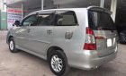 Toyota Innova 2.0E 2014 - Bán ô tô Toyota Innova 2.0E đời 2014, màu bạc số sàn, 570 triệu