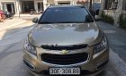 Chevrolet Cruze LT 1.6 MT 2015 - Bán xe Chevrolet Cruze LT 1.6 MT sản xuất năm 2015, màu vàng cát