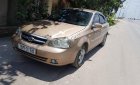 Daewoo Lacetti EX 1.6 MT 2004 - Cần bán gấp Daewoo Lacetti EX 1.6 MT năm sản xuất 2004, màu vàng, giá tốt