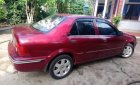 Ford Laser Ghia 1.8 MT 2003 - Chính chủ bán ô tô Ford Laser Ghia 1.8 MT 2003, màu đỏ